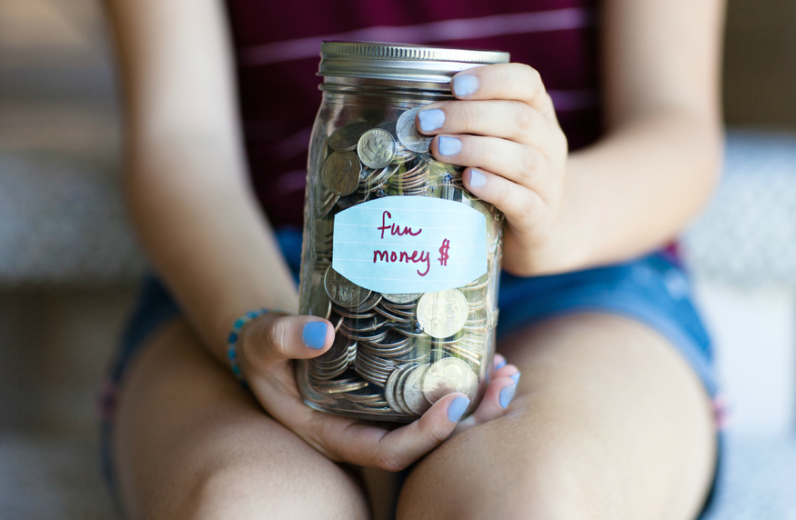 Woman Saving Money with her Personal Finance Budget