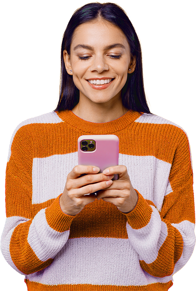 Woman in an orange sweater using phone