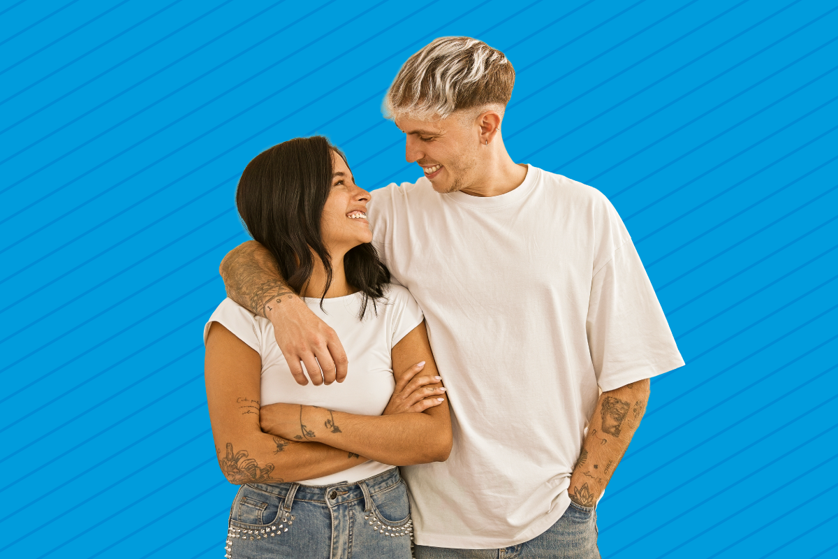 Couple in front of blue background